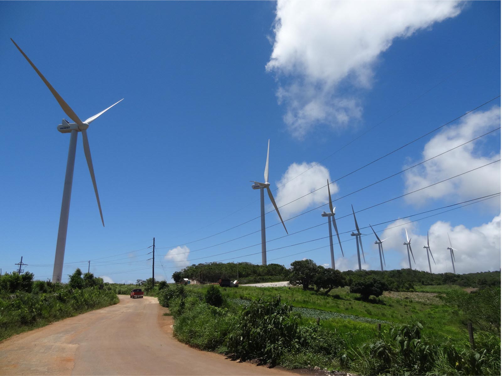 Wind turbines against a blue sky