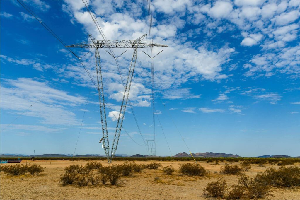 Ten West Link T-line tower with big open sky in the background