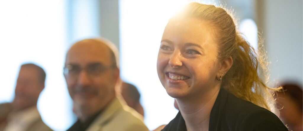 Liz Mattson attends a conference