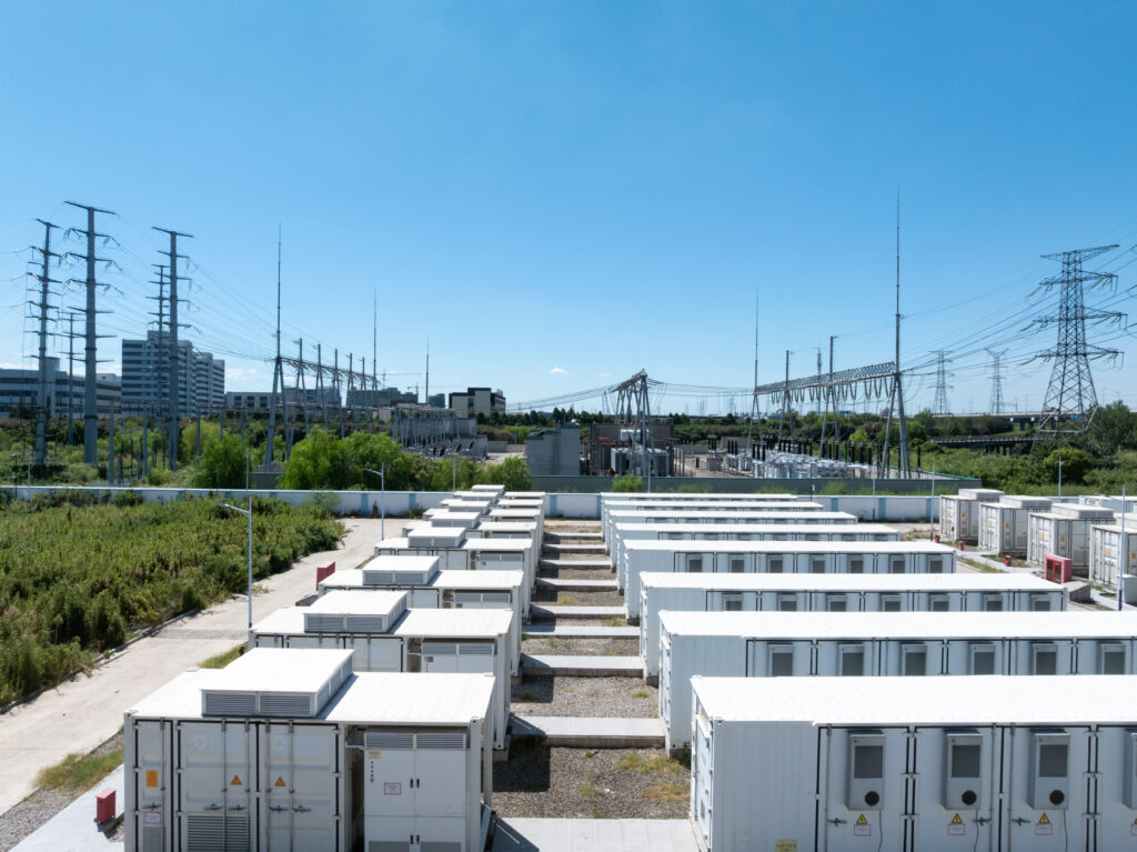 Aerial view of battery energy storage systems under a clear blue sky