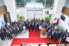 Group photo of Sargent & Lundy leaders joining with colleagues from L&T-Sargent & Lundy Limited as to mark the joint venture's 30th anniversary.